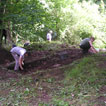 Students starting to clear the topsoil on Trench 2