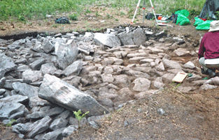 Grey Hill Cairn under excavation