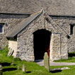 The little church at Monknash (Vale of Glamorgan) was extensively rebuilt in a more 
    vernacular style.  There is a date stone of 1628 built into the porch gable