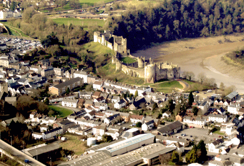 Aerial view of Chepstow town centre with the castle in the background