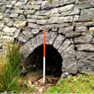 A stone built culvert on west side of on the Trevil Railroad loop