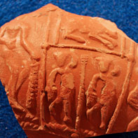 Most decorated samian was made by throwing the pot inside a mould which had been prepared by impressing it with stamps.  Experts can distinguish the potters by the pictorial stamps they used as well as by their names.