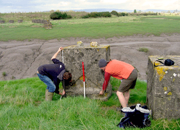 Sam and Jon Berry (Cadw) recording the anti-invasion defences at Goldcliff pill.