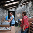 Volunteers working in the finds washing area